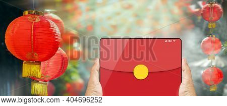 The Digital Hongbao On Cell Phone In Chinese Lunar New Year. 
Distribute Money In Paper Red Packets 