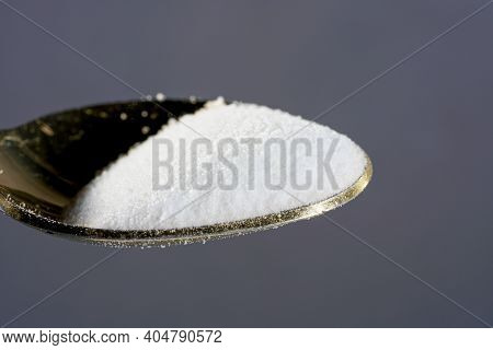 Makrogol Powder Photographed Against A Black Background In The Studio