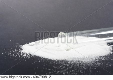 Makrogol Powder Photographed Against A Black Background In The Studio
