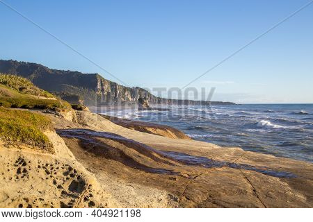 Punakaiki, New Zealand - March 18, 2015: View Of Punakaiki Beach With Special Rock Formation In The 