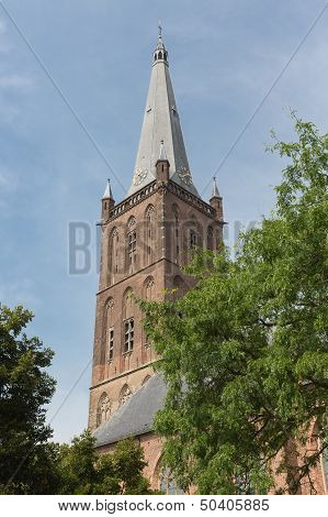 Dutch Church Tower Against A Blue Sky