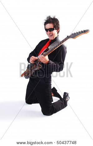 A Male Guitarrist In Action