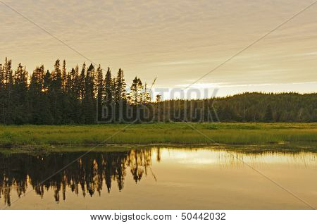 Sunset Reflections On A Remote Pond