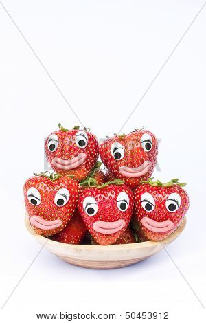 Strawberries with eyes and mouth