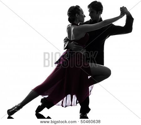 one caucasian couple man woman ballroom dancers tangoing  in silhouette studio isolated on white background