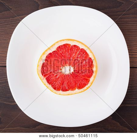 Slice of grapefruit on a palte