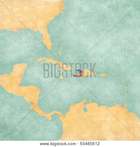 Haiti (Haitian flag) on the map of Caribbean and Central America. The Map is in vintage summer style and sunny mood. The map has a soft grunge and vintage atmosphere which acts as a watercolor painting.