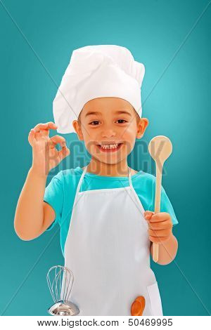 Cheerful Little Chef Showing Good Taste