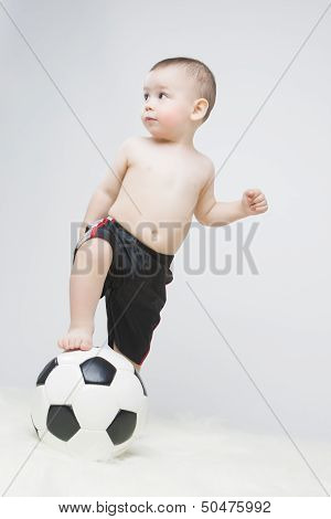 Portrait Of Little Boy With Ball