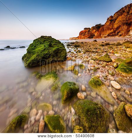 Rocks And Cliffs Of Porto De Mos Beach In The Morning, Lagos, Algarve, Portugal