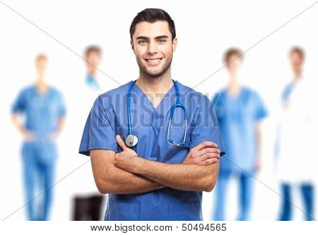 Portrait of a doctor in front of his medical team 