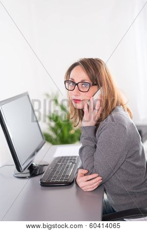 young woman working at office