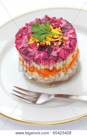 Russian traditional salad, dressed herring under fur coat