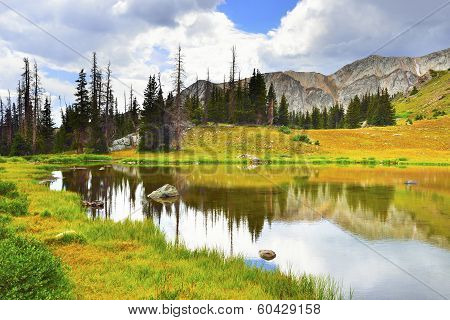 Medicine Bow Mountains And Lake With Reflection In Wyoming