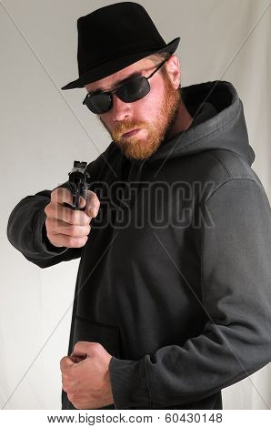 Man Holding a Pistol Gun