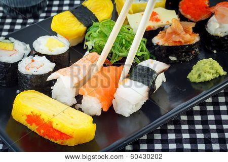 sushi with chopsticks