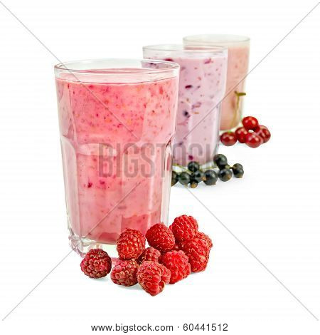 Milkshakes With Berries In Glass A Row