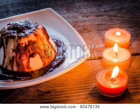 Panna Cotta Under Chocolate Sauce