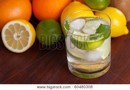 Mohito Cocktail Surrounded By Fruit