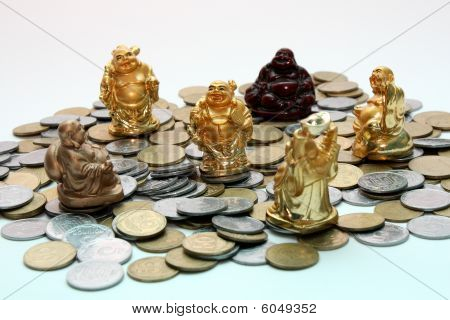 Denaro e netsuke Buddha