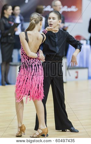 Minsk-belarus, February, 9: Unidentified Dance Couple Performs Youth-2 Latin-american Program On Ogn