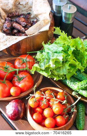Vegetables And Barbecue Meat On Spring Weekend Picnic.