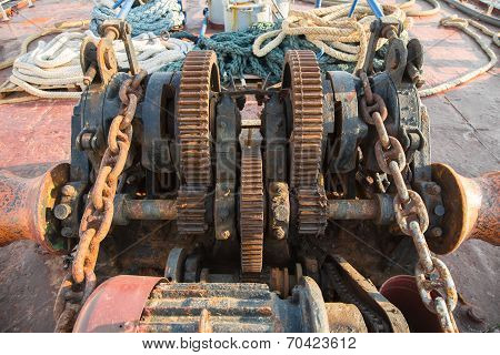 Aged Technology: Old And Rusty Gearwheel On An Old Ship - Retro And Vintage Look.