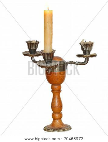Triple Candlestick With One Burning Candle