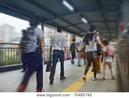people on pedestrain bridge