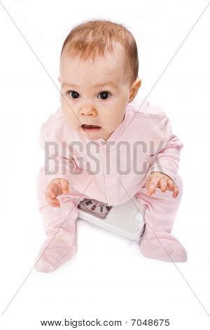 Bébé sur échelles