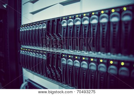 Black rack mounted server tower in large data center