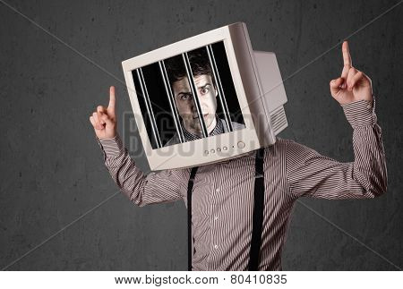 Business man with monitor screen on his head traped into a digital system concept