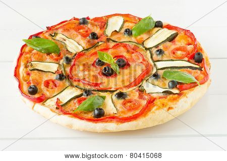 Italian Pizza With Black Olives, Cherry Tomatoes, Eggplants And Peppers
