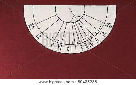 Semicircular wall sundial