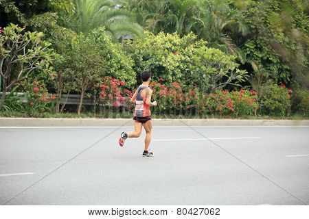 fitness marathon runner  running on road