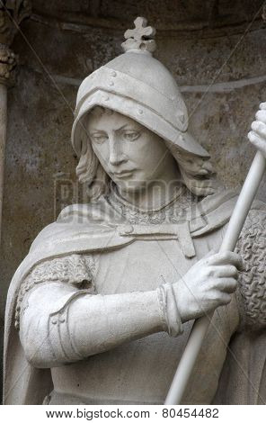 ZAGREB, CROATIA - SEP 25: statue of Saint George on the portal of the cathedral dedicated to the Assumption of Mary and to kings Saint Stephen and Saint Ladislaus in Zagreb on Sep 25, 2013.