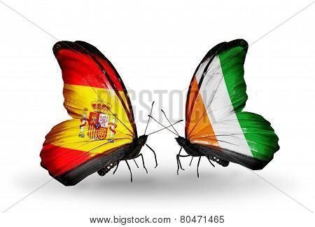 Two Butterflies With Flags On Wings As Symbol Of Relations Spain And Cote Divoire