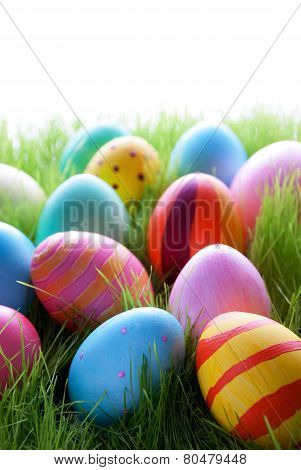 Many Colorful Easter Eggs On Green Grass