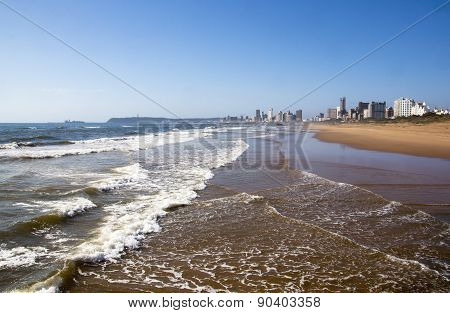 Incomming Tide At Durban Beach With Hotels In Background