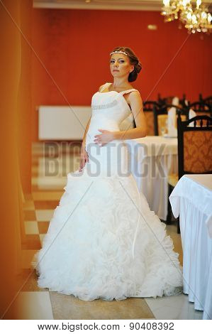 Bride With Tiara Pose At The Restauraunt