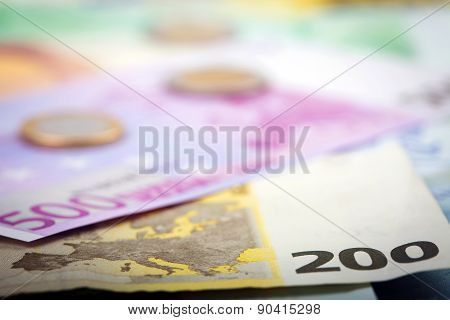 Closeup Of Euro Banknotes And Coins