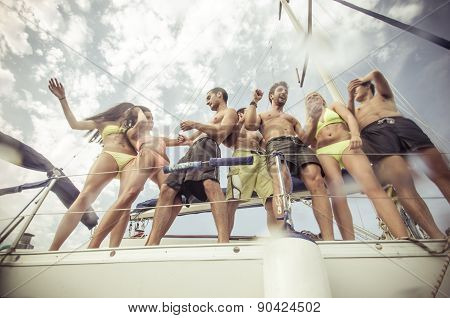 Group Of Friends Making Party On The Boat