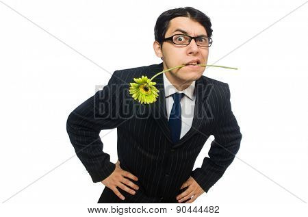 Young man in black costume with flower isolated on white