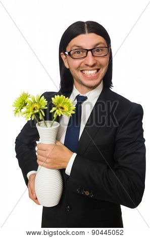 Handsome businessman holding vase of flowers isolated on white