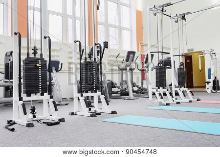Gym centre interior. Equipment, gym apparatus. 