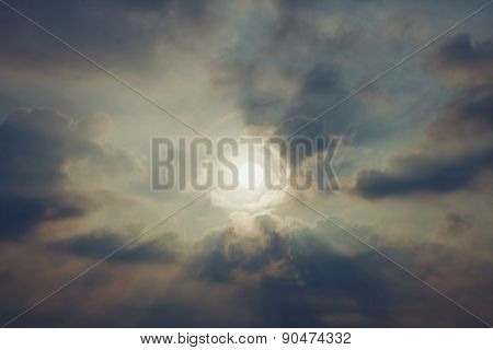 Sky With Cumulus Clouds And A Bright Sun Closeup