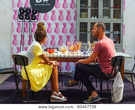 Couple Of Friends Enjoying A Conversation