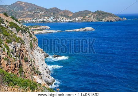 Blue Sea Meets The Rocky Shore