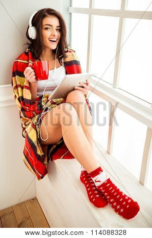 Beautiful Girl On A Window Sill