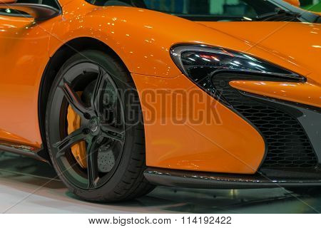 Zoom Sports Car Headlight And Wheel In Car Show Event